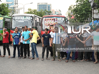 Students and job aspirants are blocking the Gulisthan intersection during a protest demanding the reinstatement of the Bangladesh government...