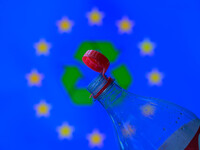 A plastic soda bottle with an attached cap (tethered cap) is being shown as per new EU regulations in Brussels, Belgium, on July 8, 2024. (