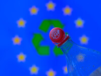 A plastic soda bottle with an attached cap (tethered cap) is being shown as per new EU regulations in Brussels, Belgium, on July 8, 2024. (