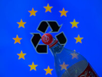 A plastic soda bottle with an attached cap (tethered cap) is being shown as per new EU regulations in Brussels, Belgium, on July 8, 2024. (