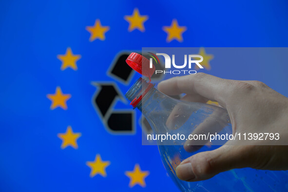 A plastic soda bottle with an attached cap (tethered cap) is being shown as per new EU regulations in Brussels, Belgium, on July 8, 2024. 