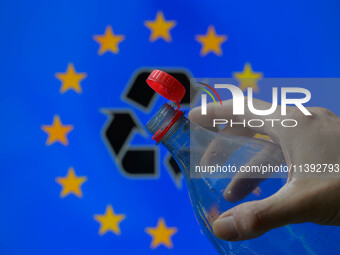 A plastic soda bottle with an attached cap (tethered cap) is being shown as per new EU regulations in Brussels, Belgium, on July 8, 2024. (