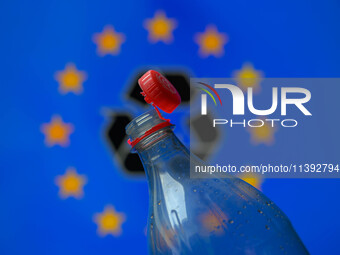 A plastic soda bottle with an attached cap (tethered cap) is being shown as per new EU regulations in Brussels, Belgium, on July 8, 2024. (