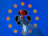 A plastic soda bottle with an attached cap (tethered cap) is being shown as per new EU regulations in Brussels, Belgium, on July 8, 2024. (