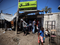 Palestinian manufacturers are bottling locally-made cleaning products in Deir el-Balah in the central Gaza Strip on July 8, 2024, amid a lac...