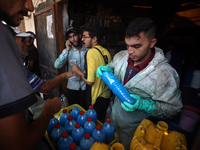 Palestinian manufacturers are bottling locally-made cleaning products in Deir el-Balah in the central Gaza Strip on July 8, 2024, amid a lac...