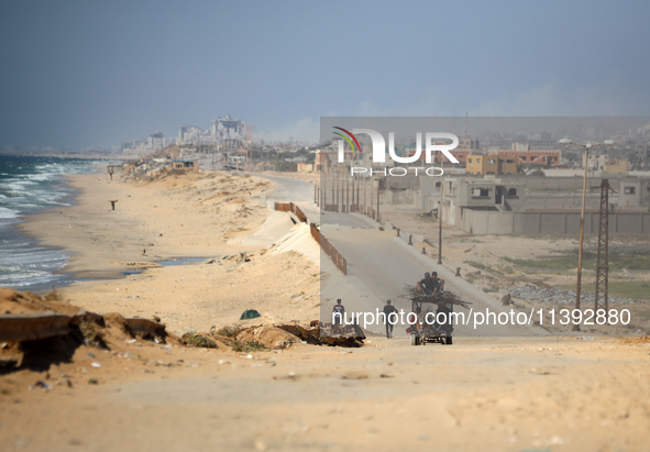 A picture is showing smoke billowing during Israeli bombardment on Gaza City in Nuseirat, in the central Gaza Strip, on July 8, 2024, amid t...