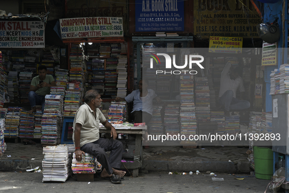 Book sellers are waiting for customers in the College Street area, in Kolkata, India, on July 8, 2024. 