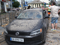 A man is leaning on a car parked near the Lukianivska metro station during a Russian missile attack in Kyiv, Ukraine, on July 8, 2024. NO US...