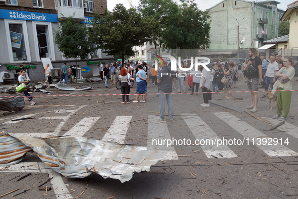 People are staying near the Lukianivska metro station during a Russian missile attack in Kyiv, Ukraine, on July 8, 2024. NO USE RUSSIA. NO U...