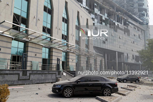 Cars are outside a building near the Lukianivska metro station damaged during a Russian missile attack in Kyiv, Ukraine, on July 8, 2024. NO...