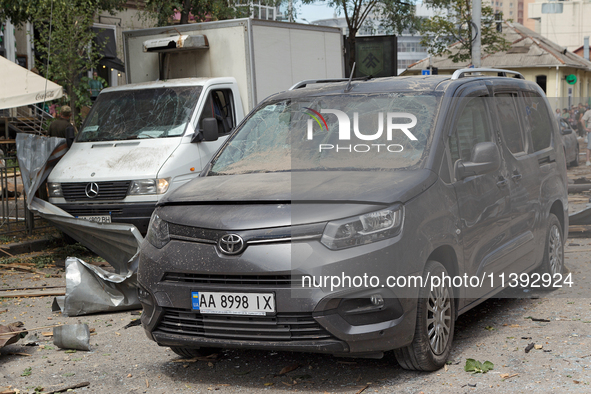 Vans are being damaged during a Russian missile attack near the Lukianivska metro station in Kyiv, Ukraine, on July 8, 2024. NO USE RUSSIA....