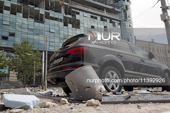 A car is outside a building near the Lukianivska metro station damaged during a Russian missile attack in Kyiv, Ukraine, on July 8, 2024. NO...