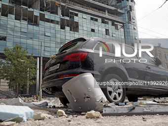 A car is outside a building near the Lukianivska metro station damaged during a Russian missile attack in Kyiv, Ukraine, on July 8, 2024. NO...