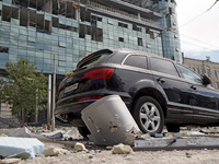 A car is outside a building near the Lukianivska metro station damaged during a Russian missile attack in Kyiv, Ukraine, on July 8, 2024. NO...