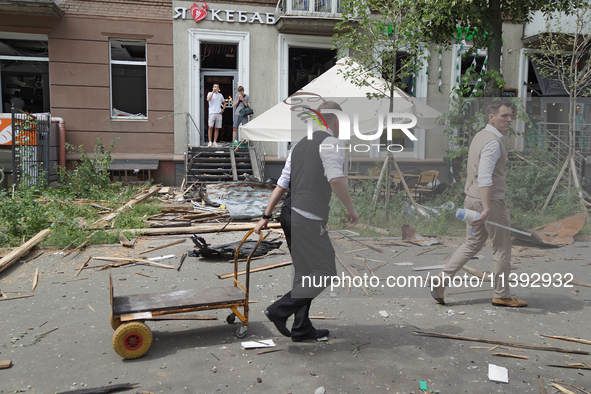 People are responding to a Russian missile attack near the Lukianivska metro station in Kyiv, Ukraine, on July 8, 2024. NO USE RUSSIA. NO US...