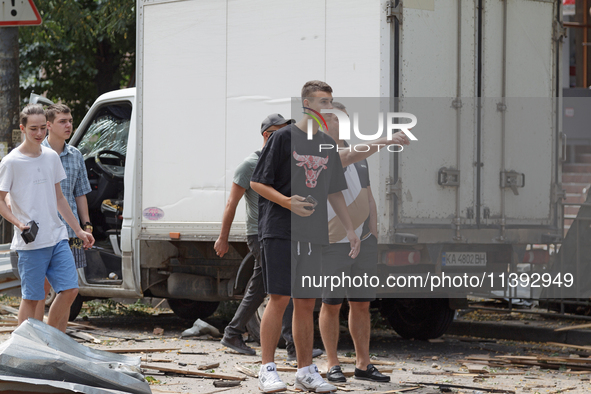 People are staying near the Lukianivska metro station during a Russian missile attack in Kyiv, Ukraine, on July 8, 2024. NO USE RUSSIA. NO U...