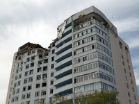 The top floors of an office building at 40 Ushynskoho Street in the Solomianskyi district are being destroyed by a Russian missile strike in...