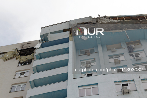 The top floors of an office building at 40 Ushynskoho Street in the Solomianskyi district are being destroyed by a Russian missile strike in...