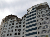 The top floors of an office building at 40 Ushynskoho Street in the Solomianskyi district are being destroyed by a Russian missile strike in...