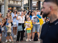 Ukrainian community protest against the Russian shelling of Ohmatdyt Children's Hospital in Kyiv, Ukraine, in Barcelona, Spain, on July 8, 2...