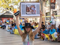 Ukrainian community protest against the Russian shelling of Ohmatdyt Children's Hospital in Kyiv, Ukraine, in Barcelona, Spain, on July 8, 2...