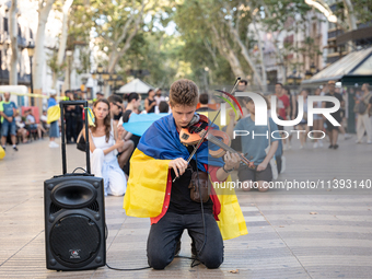 Ukrainian community protest against the Russian shelling of Ohmatdyt Children's Hospital in Kyiv, Ukraine, in Barcelona, Spain, on July 8, 2...