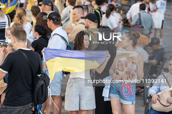 Ukrainian community protest against the Russian shelling of Ohmatdyt Children's Hospital in Kyiv, Ukraine, in Barcelona, Spain, on July 8, 2...