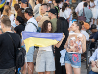 Ukrainian community protest against the Russian shelling of Ohmatdyt Children's Hospital in Kyiv, Ukraine, in Barcelona, Spain, on July 8, 2...