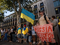 Ukrainian community protest against the Russian shelling of Ohmatdyt Children's Hospital in Kyiv, Ukraine, in Barcelona, Spain, on July 8, 2...