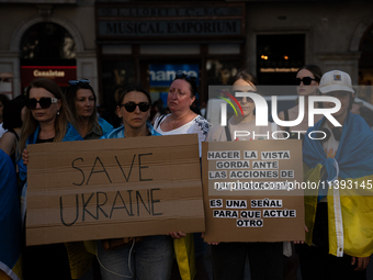 Ukrainian community protest against the Russian shelling of Ohmatdyt Children's Hospital in Kyiv, Ukraine, in Barcelona, Spain, on July 8, 2...