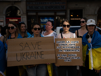 Ukrainian community protest against the Russian shelling of Ohmatdyt Children's Hospital in Kyiv, Ukraine, in Barcelona, Spain, on July 8, 2...