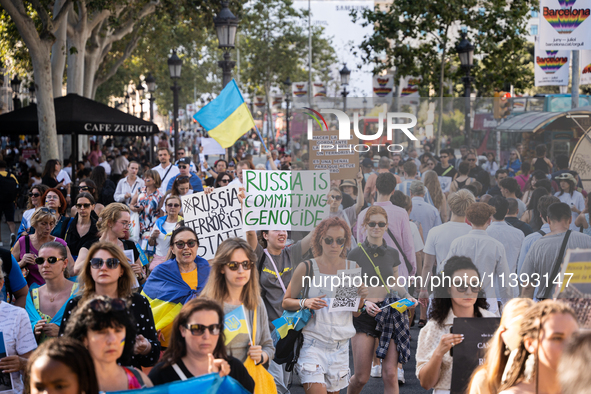 Ukrainian community protest against the Russian shelling of Ohmatdyt Children's Hospital in Kyiv, Ukraine, in Barcelona, Spain, on July 8, 2...