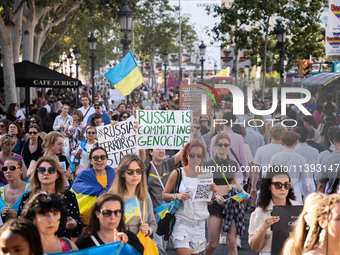 Ukrainian community protest against the Russian shelling of Ohmatdyt Children's Hospital in Kyiv, Ukraine, in Barcelona, Spain, on July 8, 2...