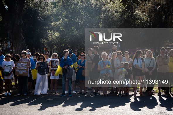 Ukrainian community protest against the Russian shelling of Ohmatdyt Children's Hospital in Kyiv, Ukraine, in Barcelona, Spain, on July 8, 2...