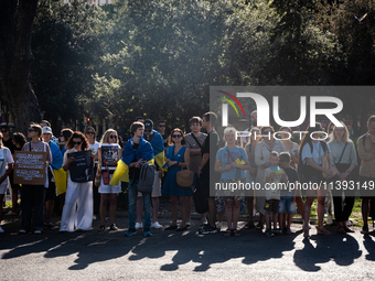 Ukrainian community protest against the Russian shelling of Ohmatdyt Children's Hospital in Kyiv, Ukraine, in Barcelona, Spain, on July 8, 2...