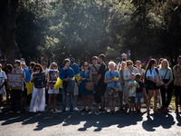 Ukrainian community protest against the Russian shelling of Ohmatdyt Children's Hospital in Kyiv, Ukraine, in Barcelona, Spain, on July 8, 2...