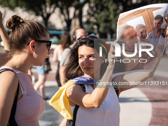 Ukrainian community protest against the Russian shelling of Ohmatdyt Children's Hospital in Kyiv, Ukraine, in Barcelona, Spain, on July 8, 2...