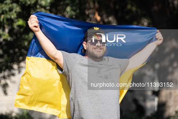 Ukrainian community protest against the Russian shelling of Ohmatdyt Children's Hospital in Kyiv, Ukraine, in Barcelona, Spain, on July 8, 2...