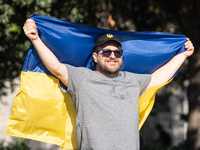 Ukrainian community protest against the Russian shelling of Ohmatdyt Children's Hospital in Kyiv, Ukraine, in Barcelona, Spain, on July 8, 2...