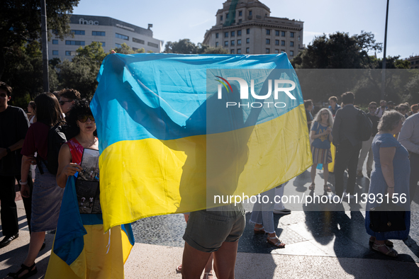 Ukrainian community protest against the Russian shelling of Ohmatdyt Children's Hospital in Kyiv, Ukraine, in Barcelona, Spain, on July 8, 2...