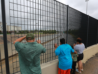 Spectators are taking pictures and videos of the flooding on I10 at Washington St. in Houston, Texas, on July 8, 2024. (