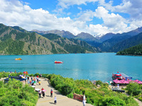 Tourists are visiting the Tianchi Scenic spot in Fukang, China, on July 8, 2024. (