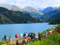 Tourists are visiting the Tianchi Scenic spot in Fukang, China, on July 8, 2024. (