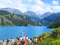 Tourists are visiting the Tianchi Scenic spot in Fukang, China, on July 8, 2024. (