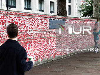 A view of the National Covid Memorial Wall in London, Great Britain July 3, 2024. (Photo by Jakub Porzycki/NurPhoto)