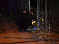 Evidence markers are being placed at the crime scene. A mass shooting is injuring four people in Washington, D.C., United States, on July 8,...