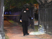 Evidence markers are being placed at the crime scene. A mass shooting is injuring four people in Washington, D.C., United States, on July 8,...