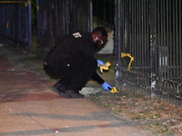 Evidence markers are being placed at the crime scene. A mass shooting is injuring four people in Washington, D.C., United States, on July 8,...