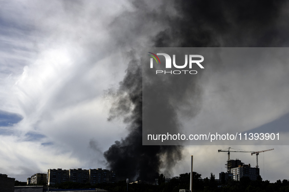 Black smoke is rising in the sky over the city after a Russian missile strike in Kyiv, Ukraine, on July 08, 2024, amid the Russian invasion....